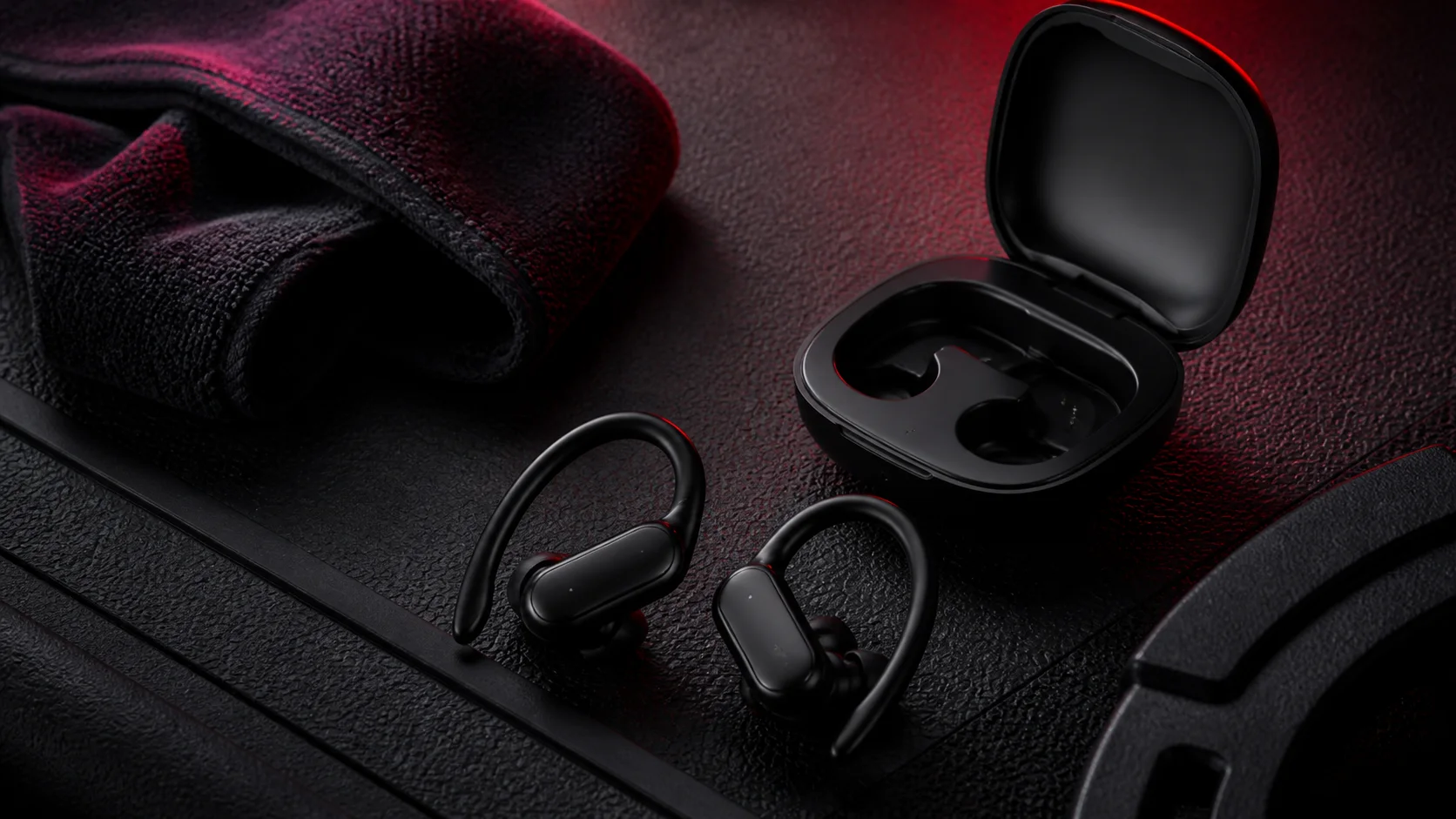 Écouteurs de sport noirs avec contours d'oreille et boîtier