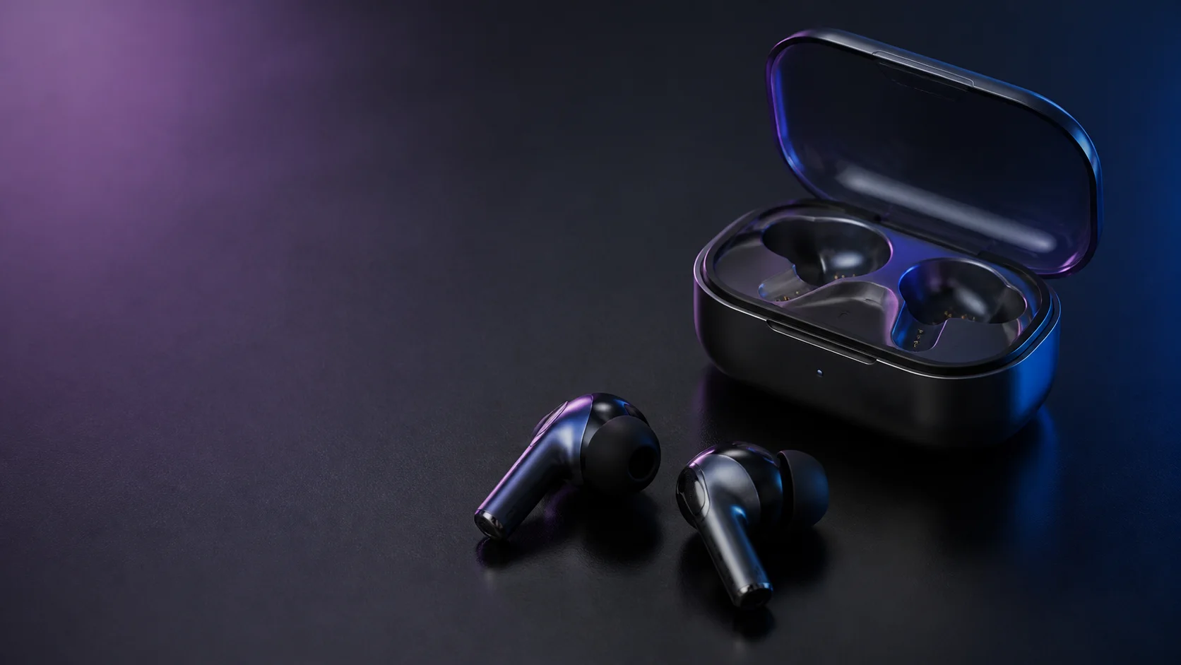 Écouteurs sans fil graphite avec leur boîtier de charge