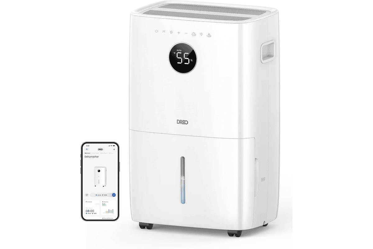 Déshumidificateur DREO 110-Pint pour grande surface posé au sol dans un salon lumineux
