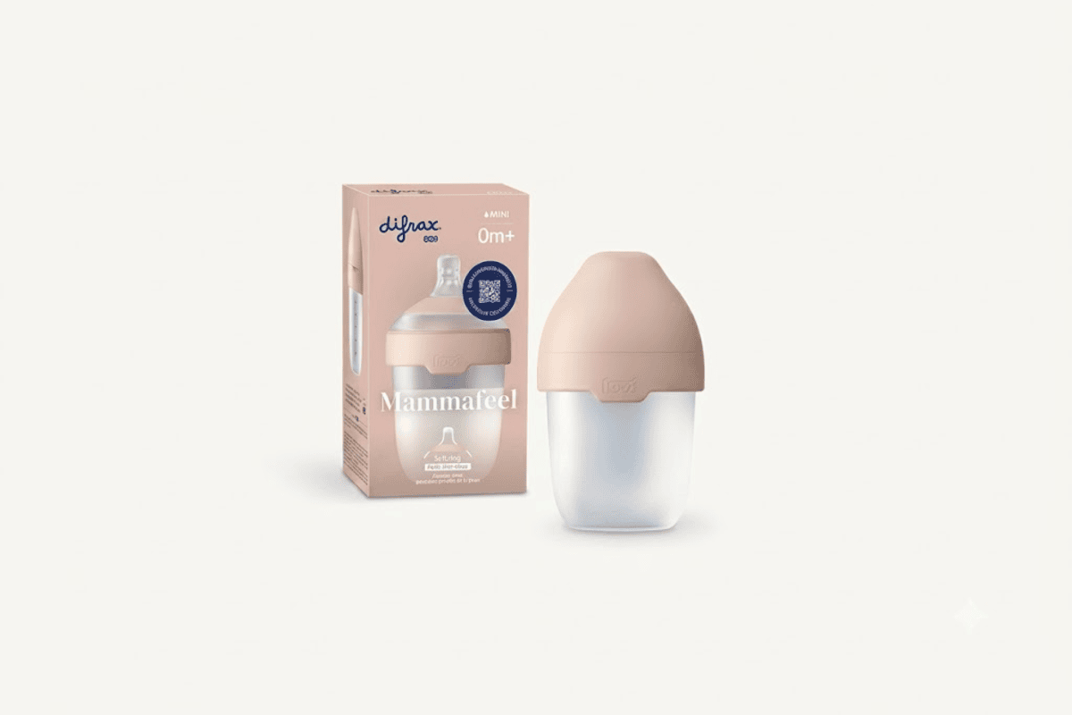 Biberon Difrax LOVI Mammafeel 0m+ format mini beige et blanc avec sa boîte cartonnée sur fond blanc