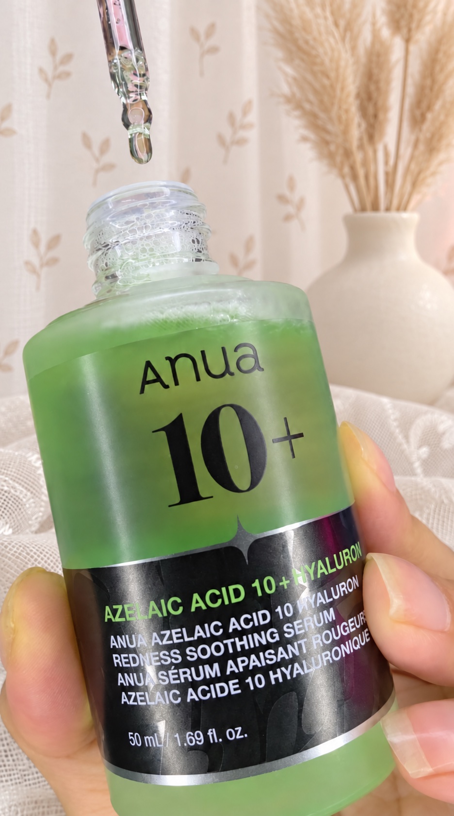Texture et pipette du sérum vert Anua à l'acide azélaïque